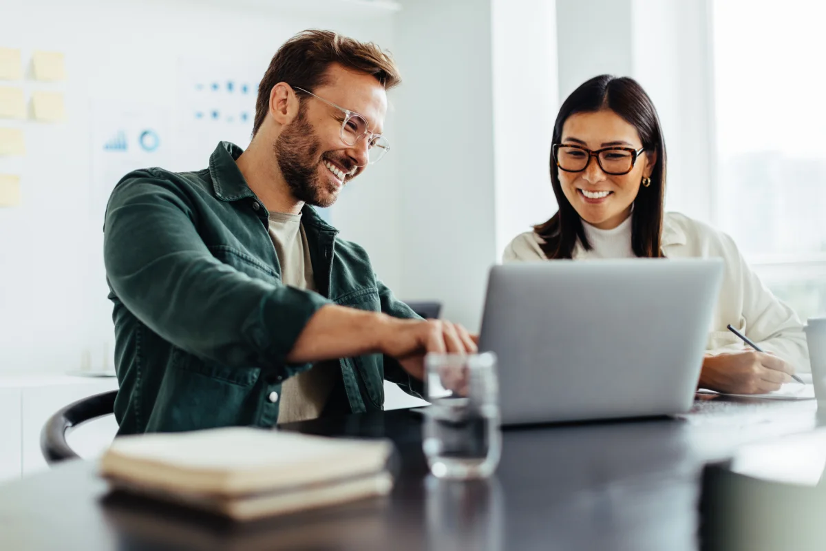 Braces in Queensland: What They Really Cost in 2026 Person planning the cost of braces in Queensland with a calculator and paperwork